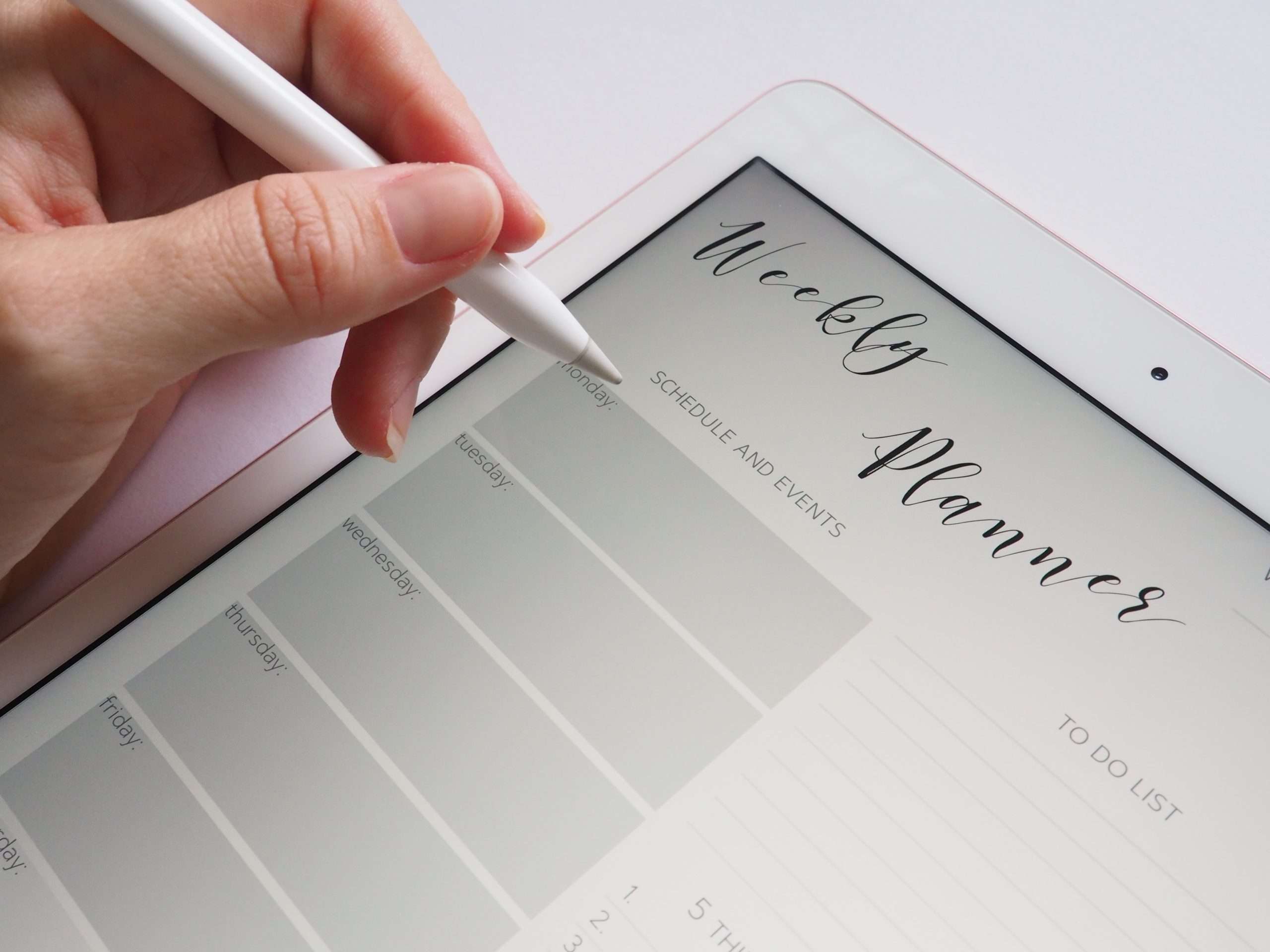 writing in weekly planner
