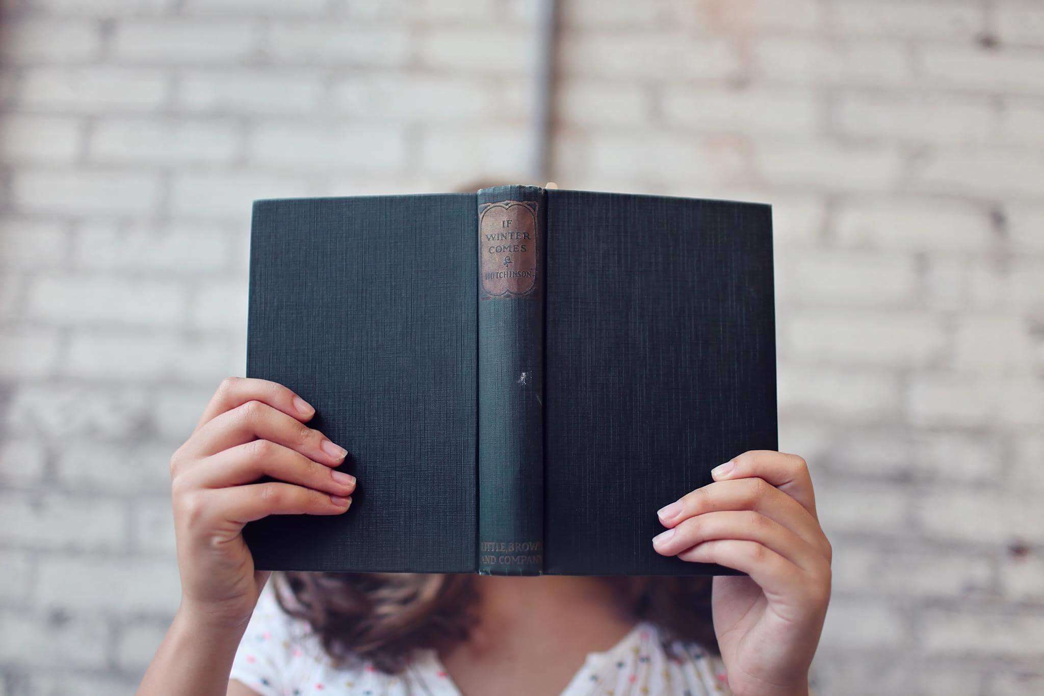 woman reading book cover image
