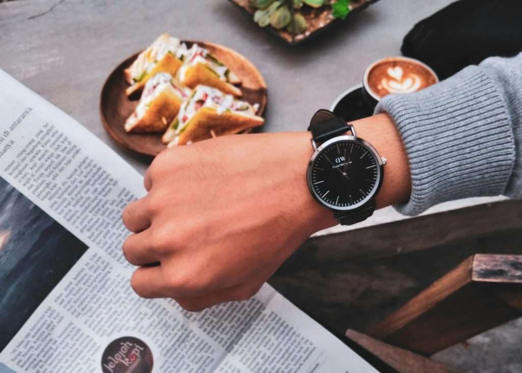 checking wrist watch