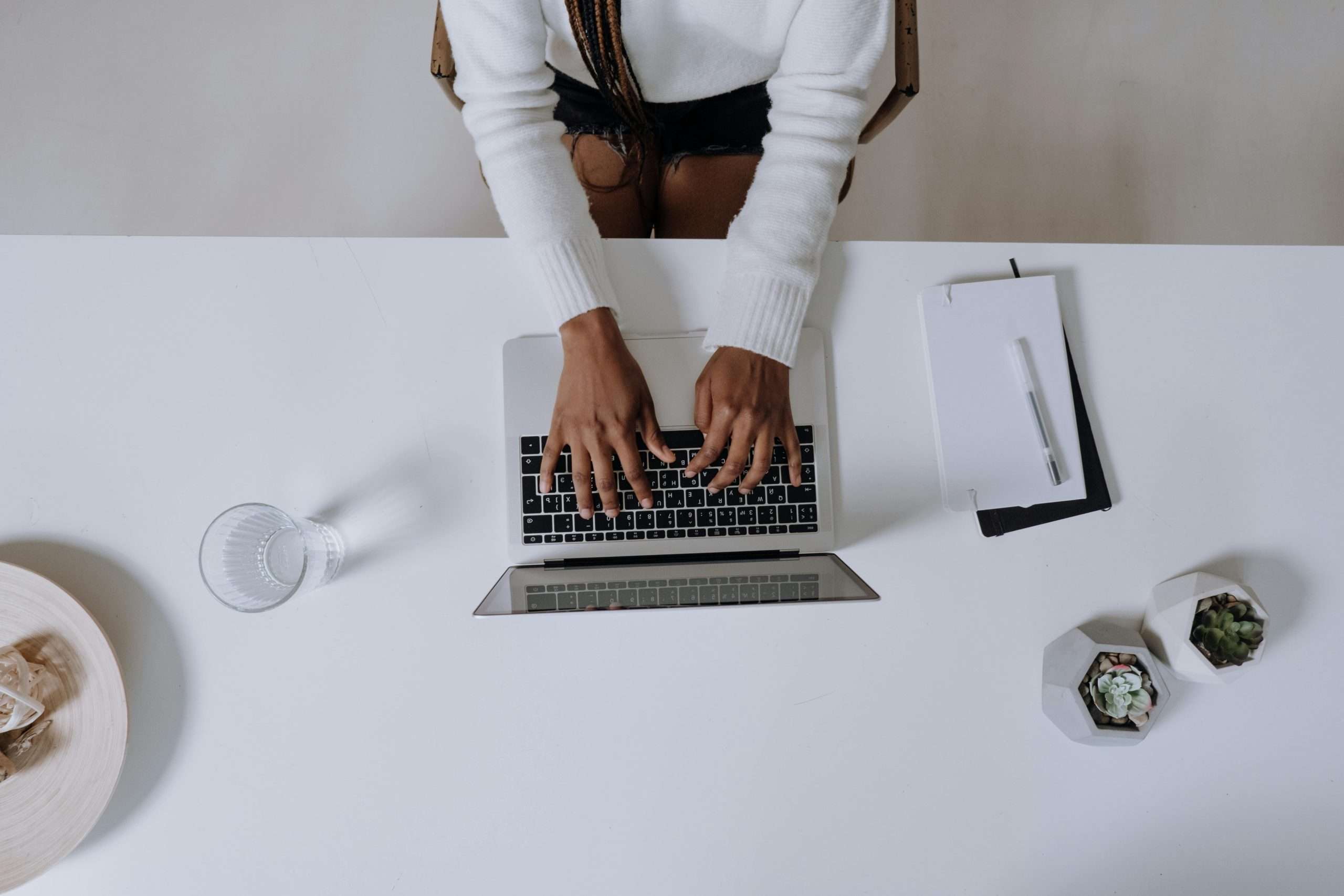 sitting with laptop