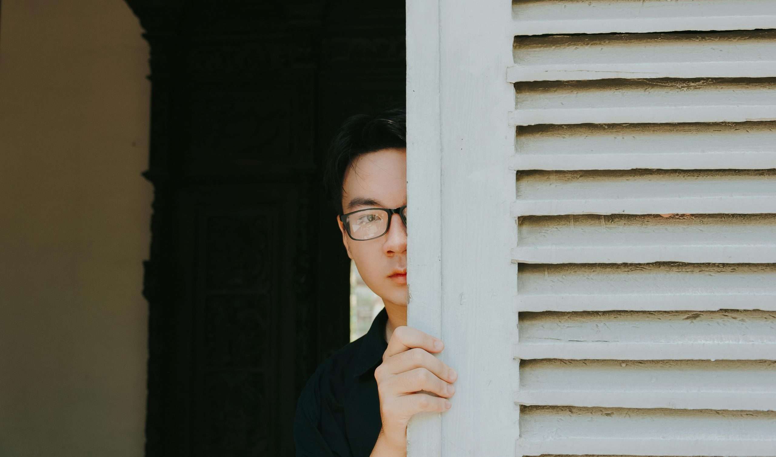 man opening door