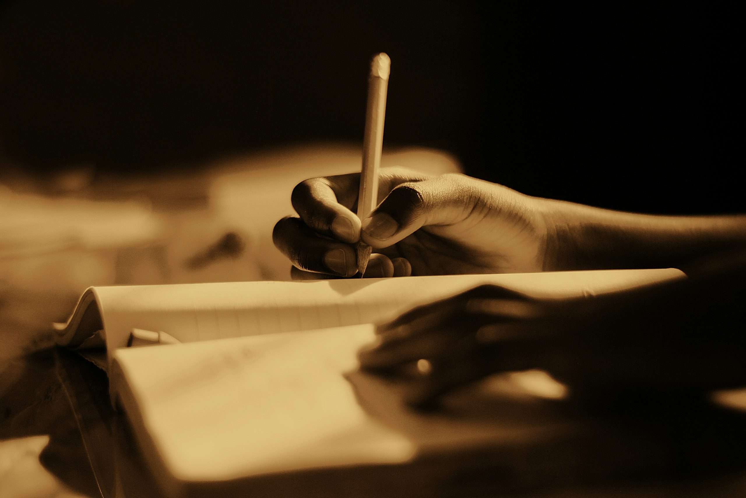 a person writing a draft for their story